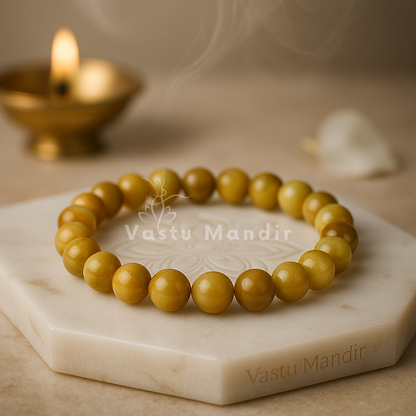 Natural cat's eye crystal bracelet shown with a hand in a lifestyle photograph