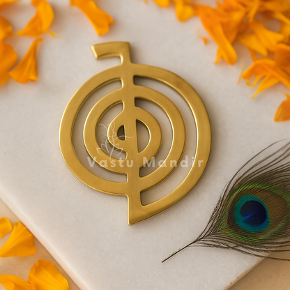 Brass cho ku rei symbol displayed in a softly lit product setting