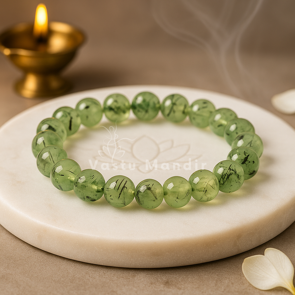 Natural prehnite crystal bracelet shown with a hand in a lifestyle photograph