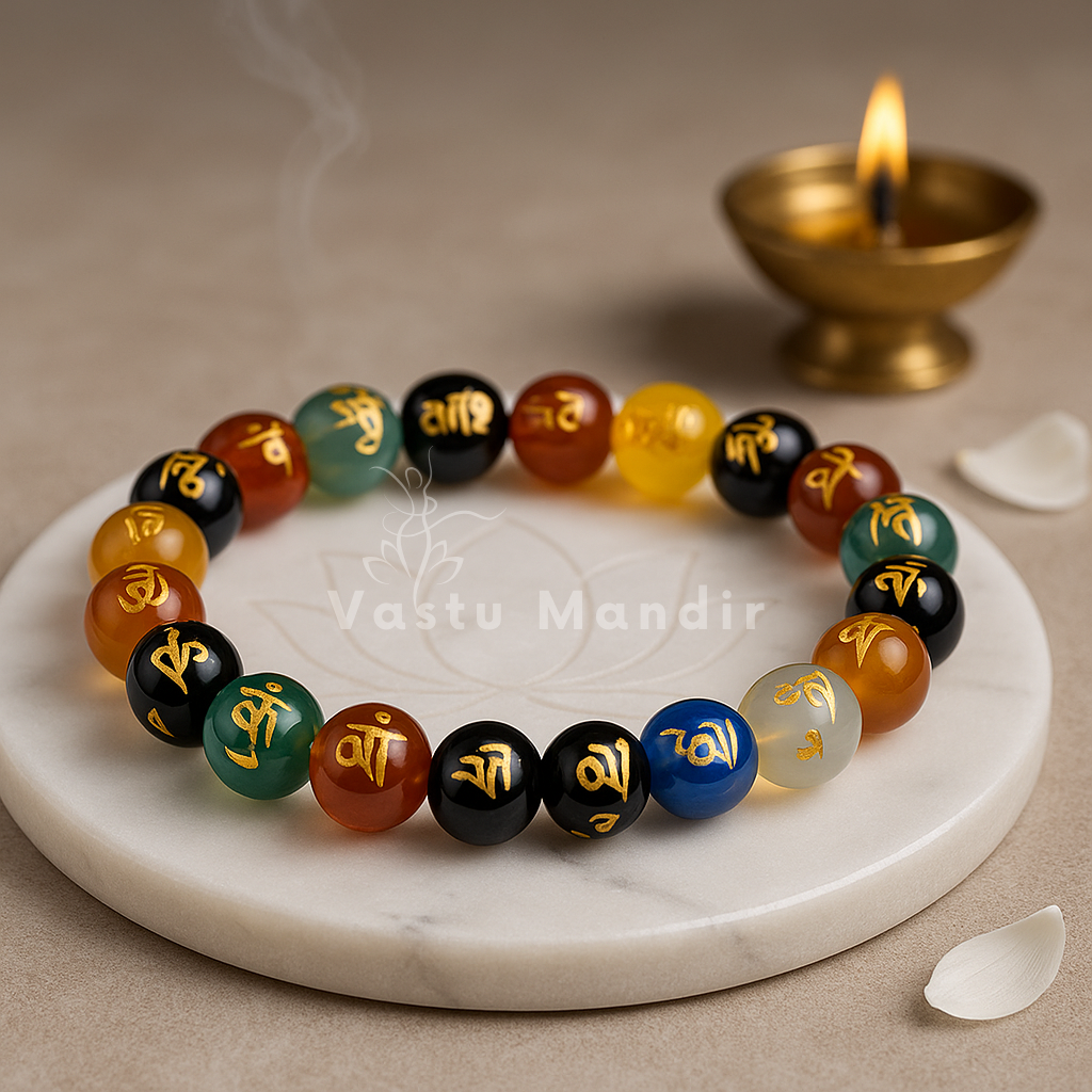 Om mani padme crystal bracelet shown with a hand in a lifestyle photograph