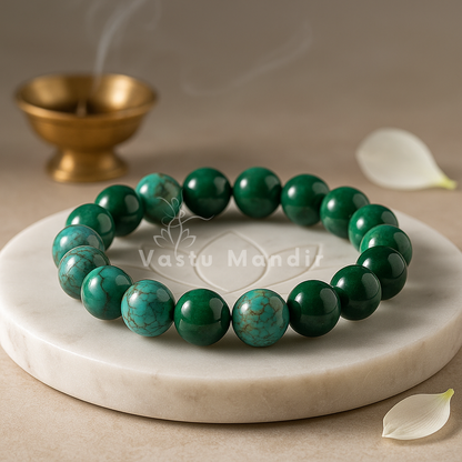 Chrysocolla crystal bracelet shown in a second hand-held product view