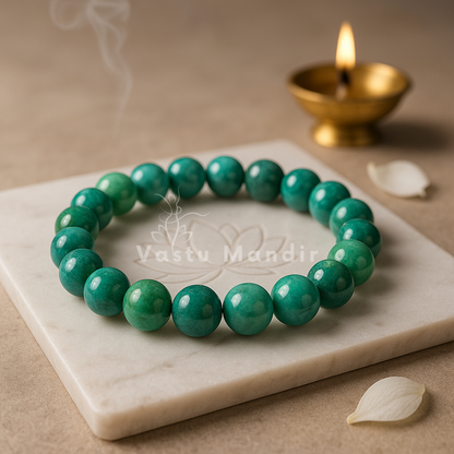 Chrysocolla crystal bracelet shown with a hand in a lifestyle photograph