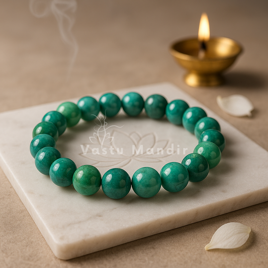 Chrysocolla crystal bracelet shown with a hand in a lifestyle photograph