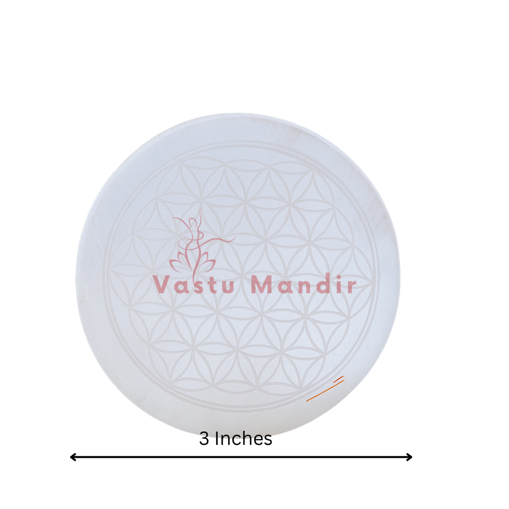 Mandala selenite plate showing its form against a plain white background