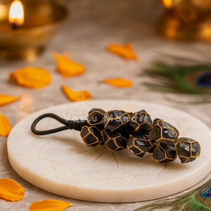 Black tourmaline chunk arranged in a styled spiritual setting