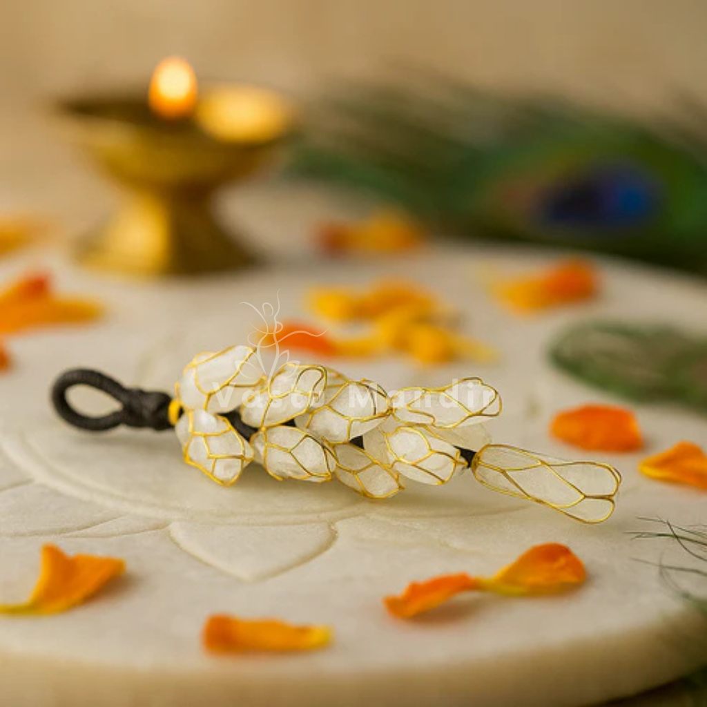 Selenite energy chunk arranged in a styled spiritual setting