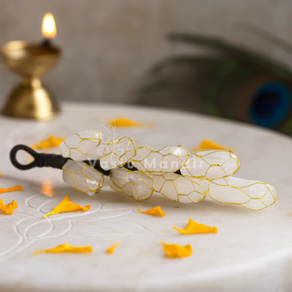 Selenite energy chunk displayed in a softly lit product setting