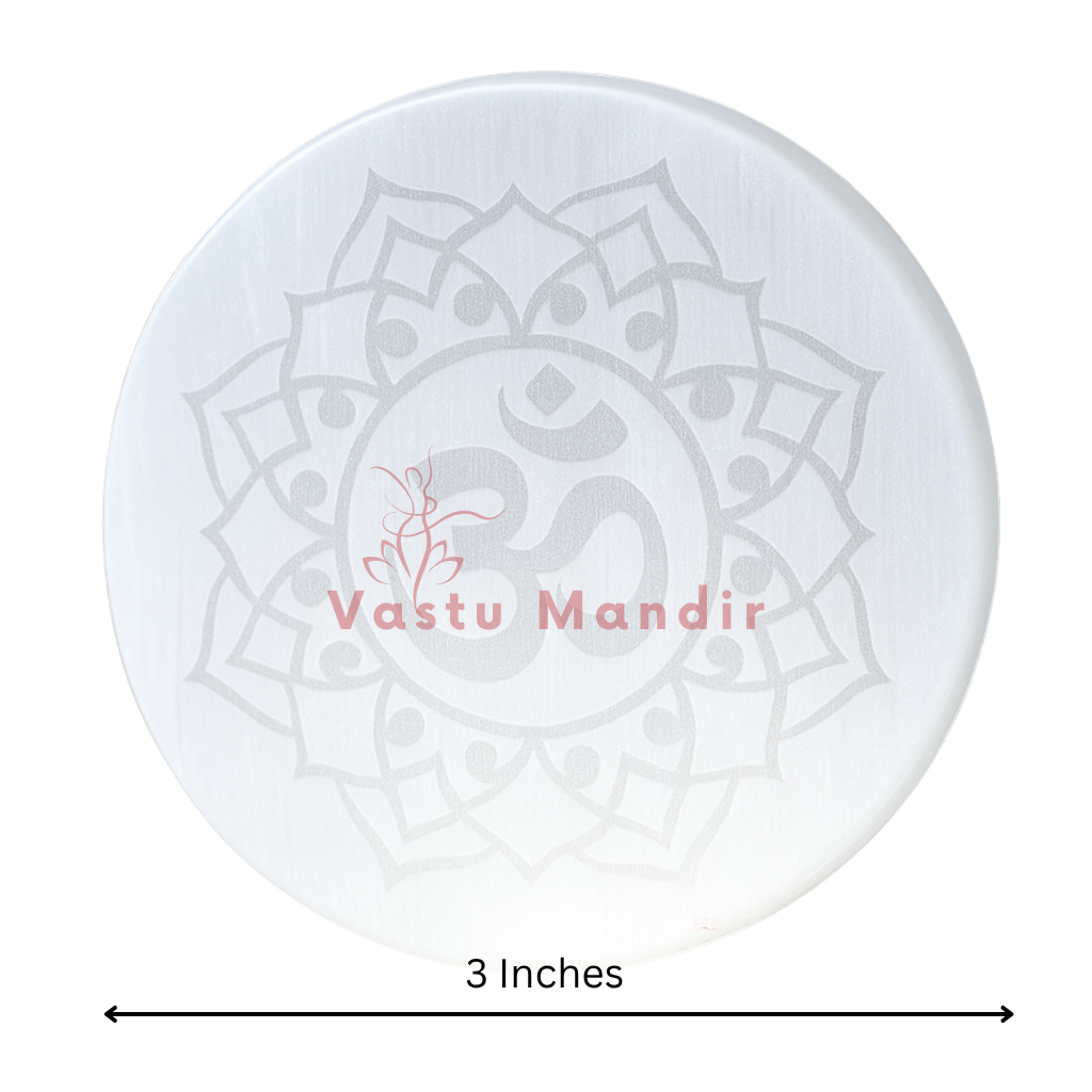 Om symbol selenite plate in a close-up view against a clean white background