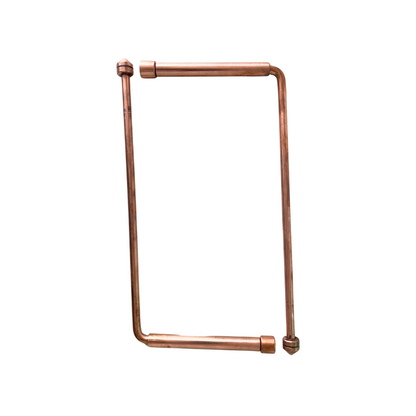 Angled copper dowsing rod pair with polished metal handles on white