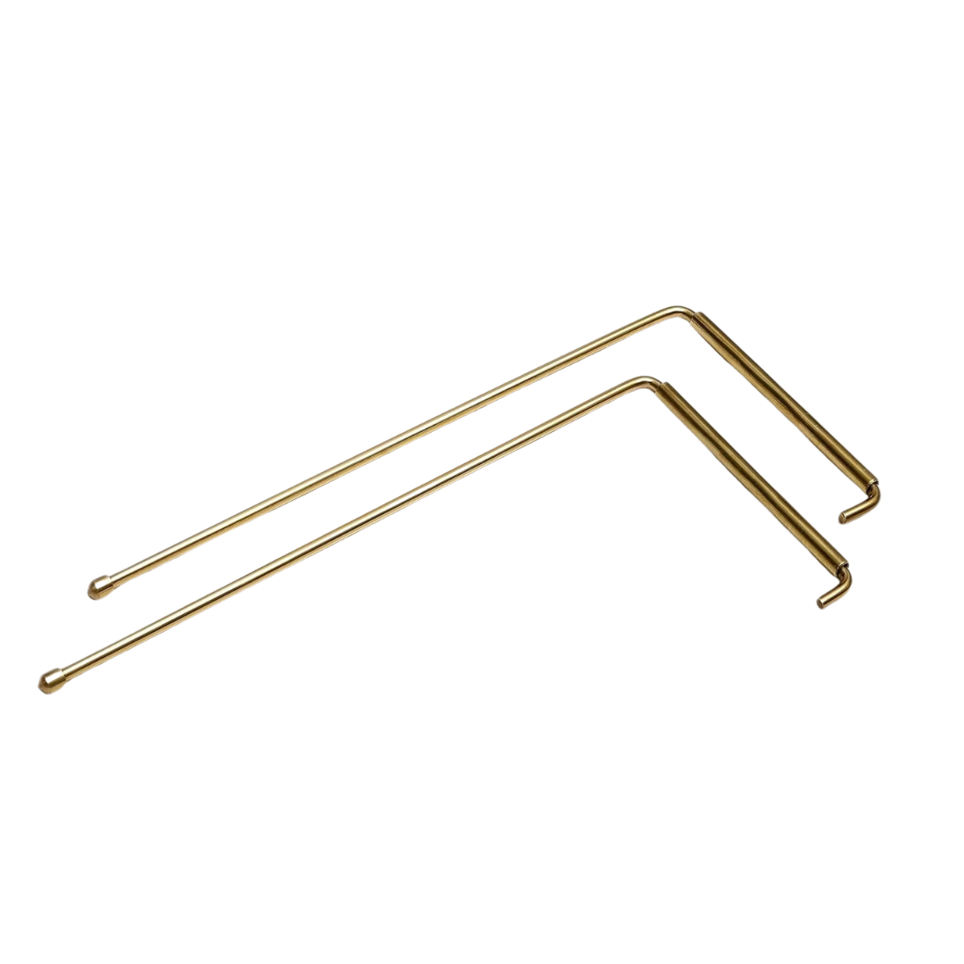 Plain brass L-shaped dowsing rods isolated on a white background