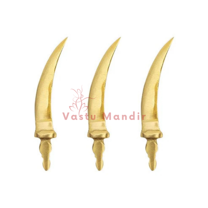 Curved brass talwar miniature three curved brass talwar miniatures isolated on white