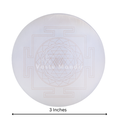 Shree yantra selenite plate on a clean white background