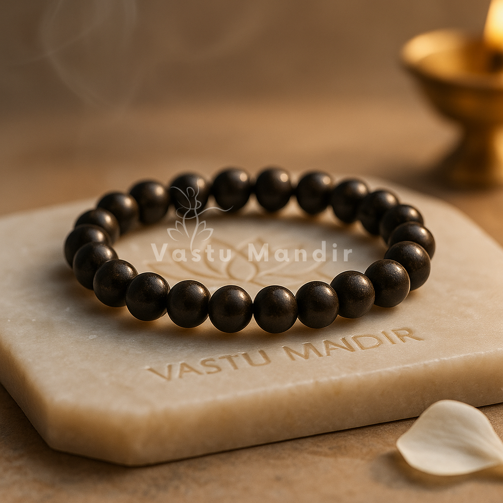 Natural bronzite crystal bracelet shown in a second hand-held product view