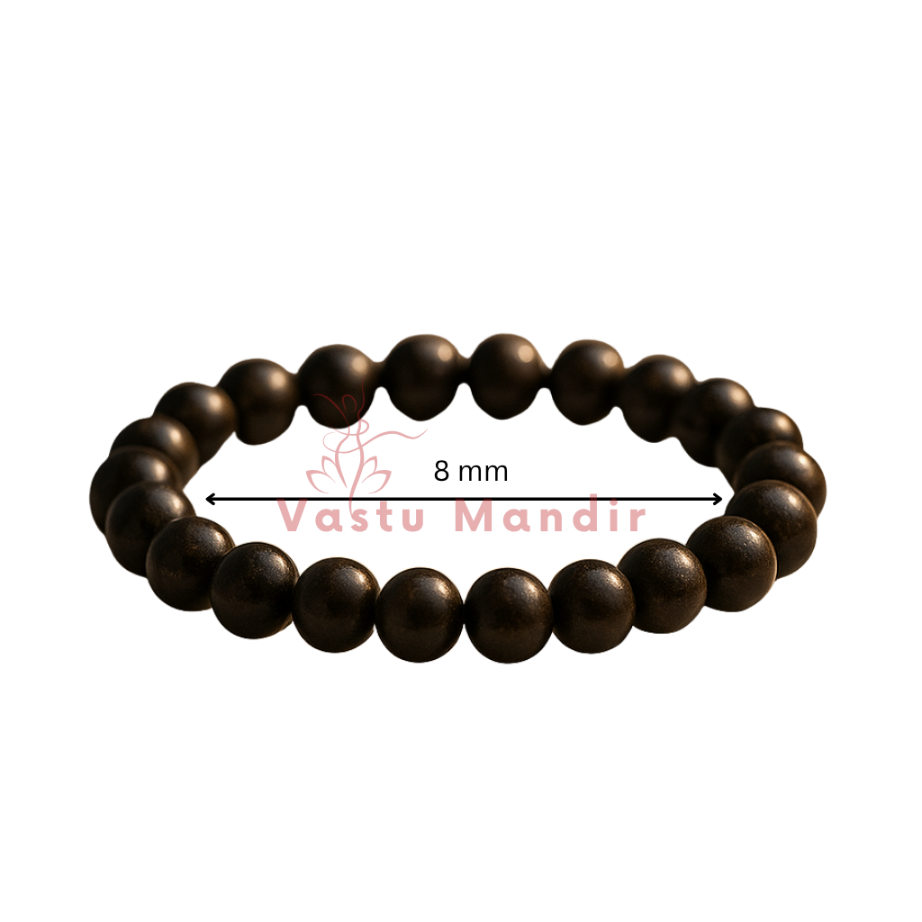 Natural bronzite crystal bracelet showing the bead colour and surface on white