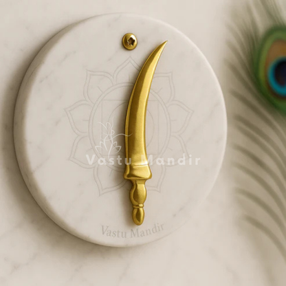 Curved brass talwar miniature close front view of the curved blade and decorated handle