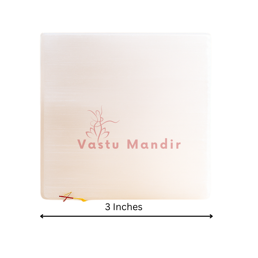 Smooth square selenite plate showing its form against a plain white background