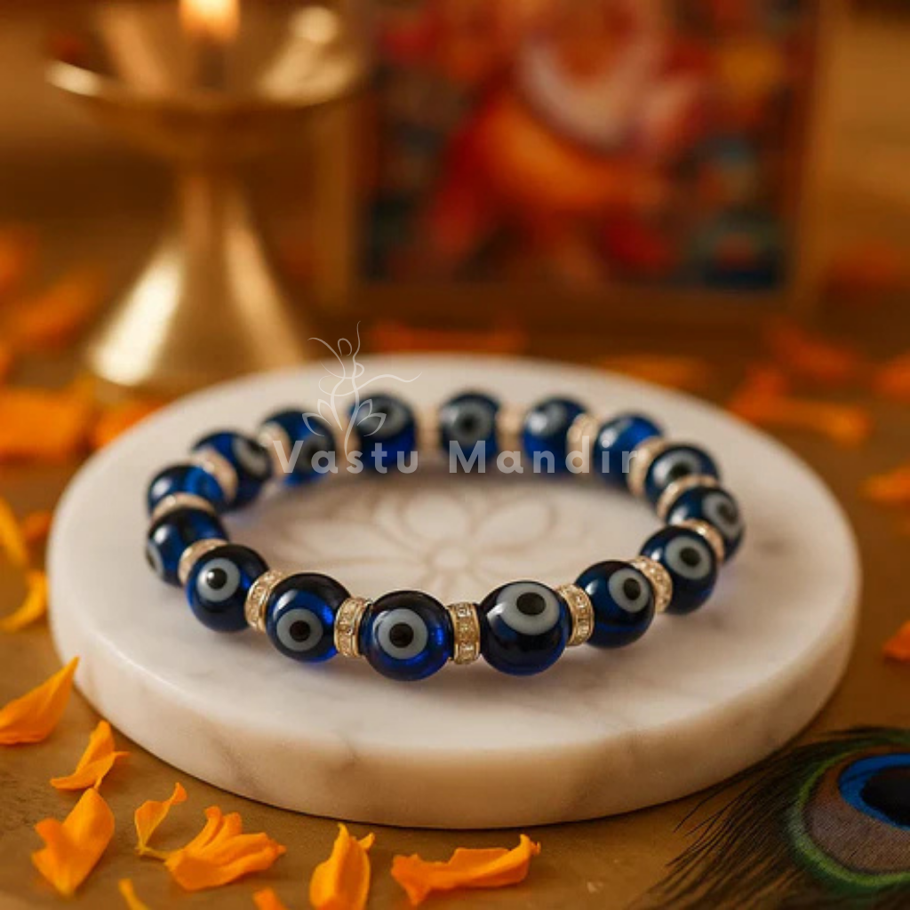 Evil eye crystal bracelet shown in a second hand-held product view