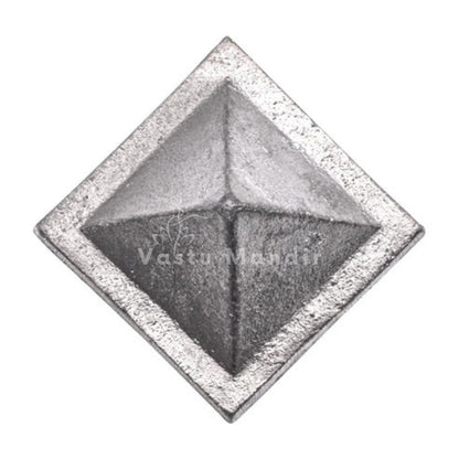 Top view of solid zinc pyramid showing its square base and four triangular faces