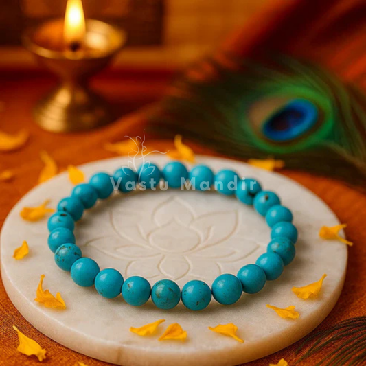 Natural turquoise/firoza crystal bracelet shown with a hand in a lifestyle photograph