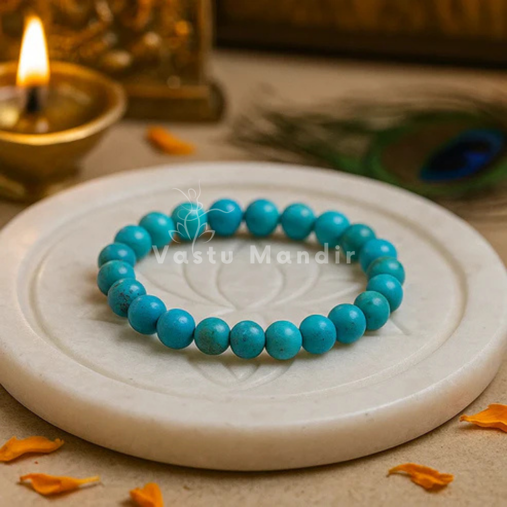 Natural turquoise/firoza crystal bracelet shown in a second hand-held product view