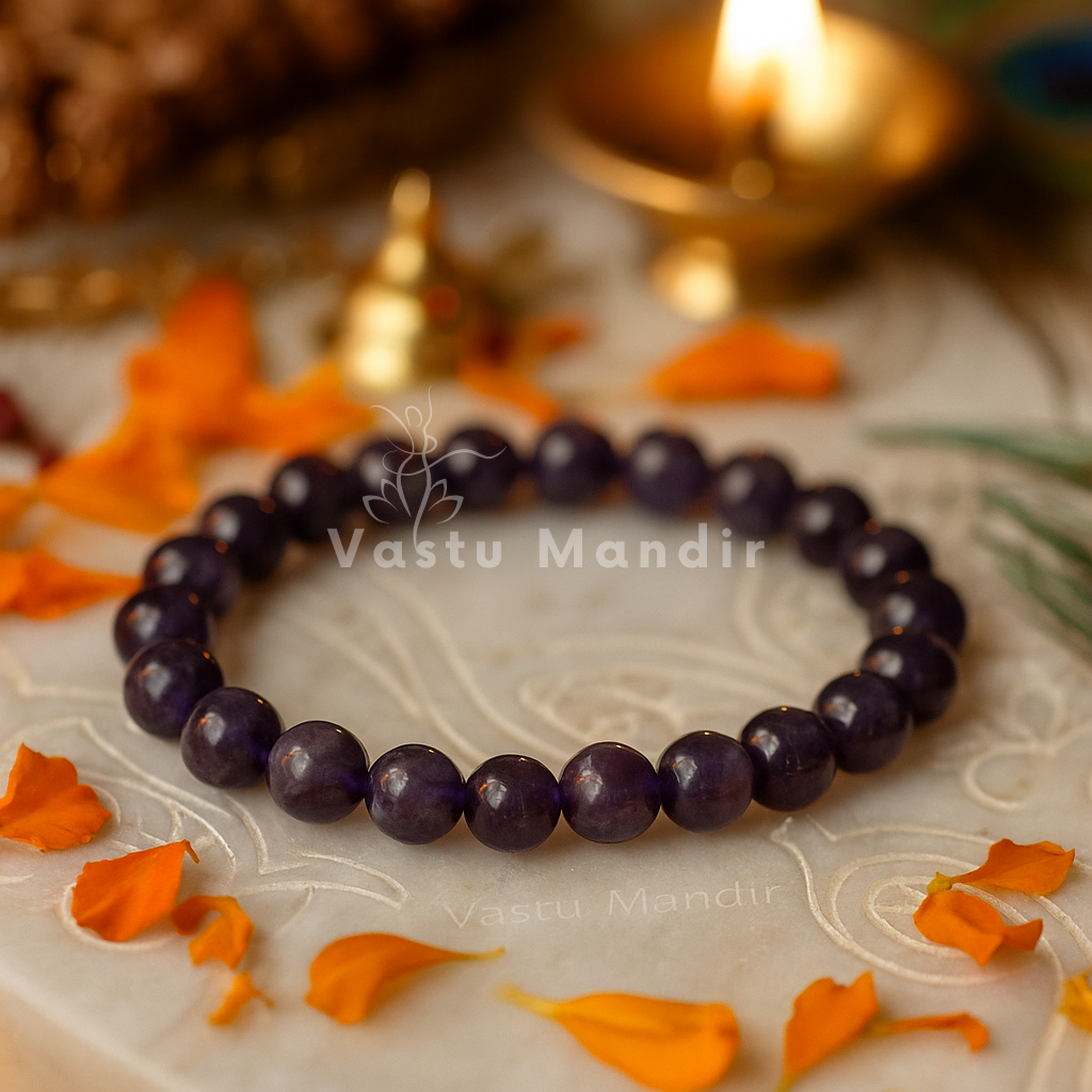Natural amethyst crystal bracelet shown in a second hand-held product view