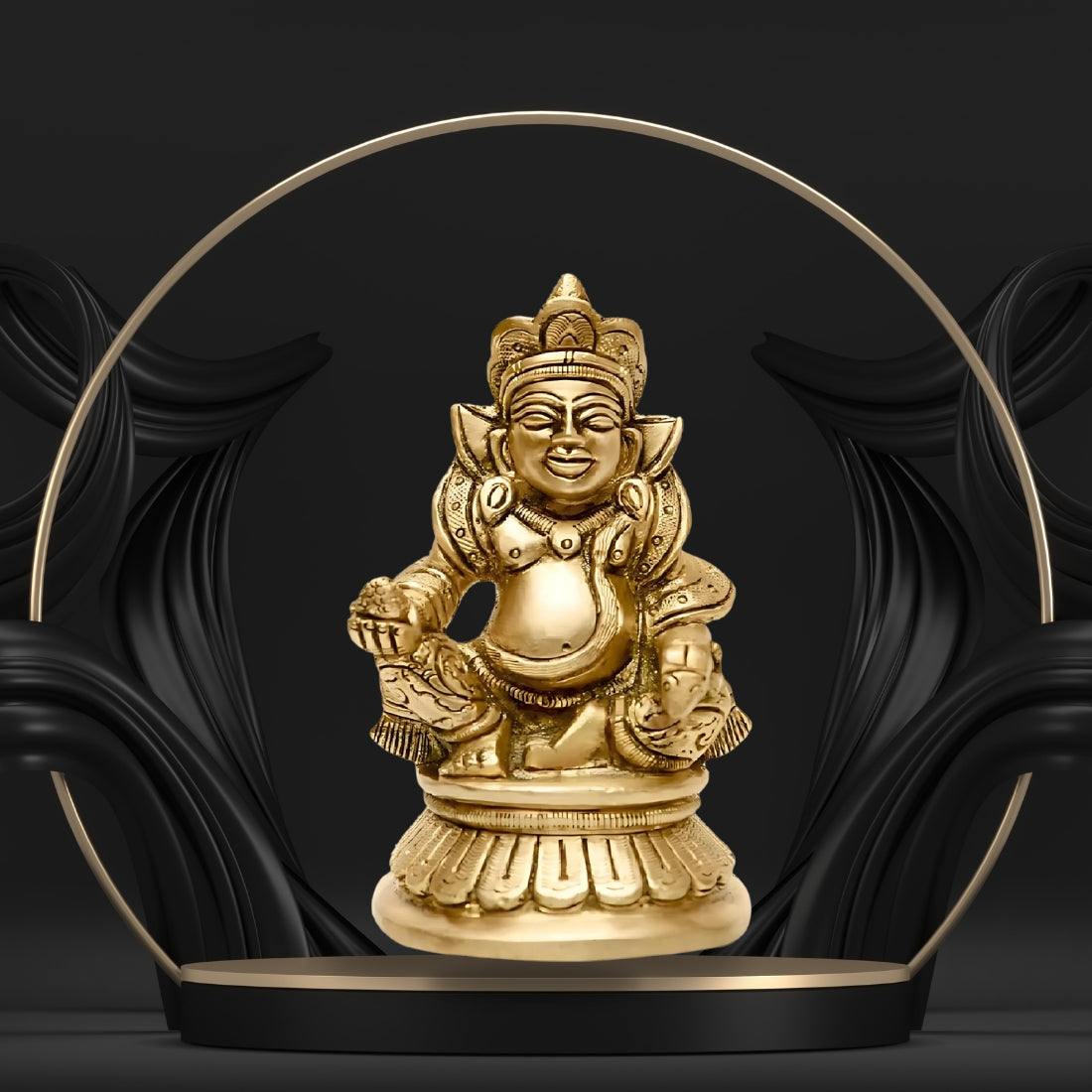 Brass Kuber Ji idol displayed against a black-and-gold decorative backdrop