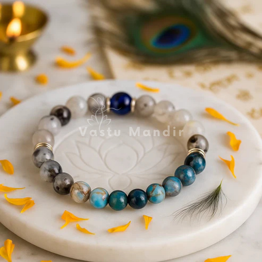 Gemini zodiac crystal bracelet shown with a hand in a lifestyle photograph
