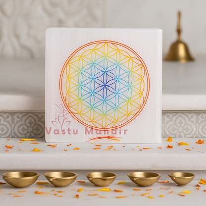 Mandala selenite plate arranged in a styled spiritual setting