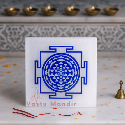 Shree yantra selenite plate displayed in a softly lit product setting