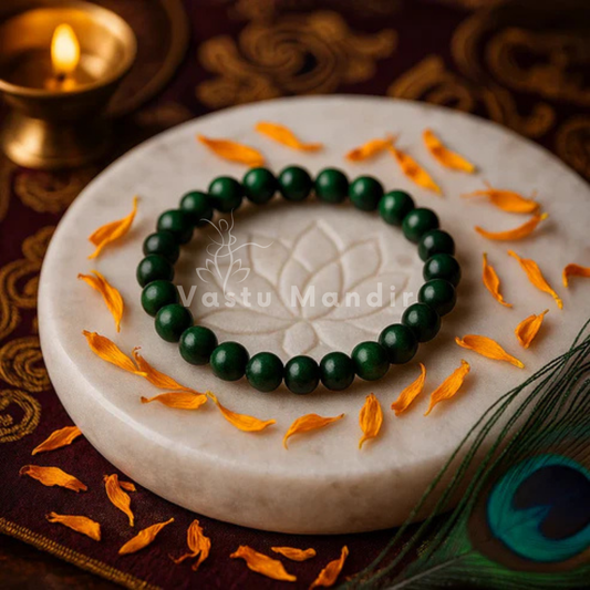 Natural green tiger eye crystal bracelet shown with a hand in a lifestyle photograph