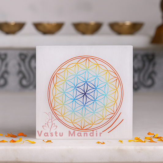 Colored mandala selenite plate displayed in a softly lit product setting
