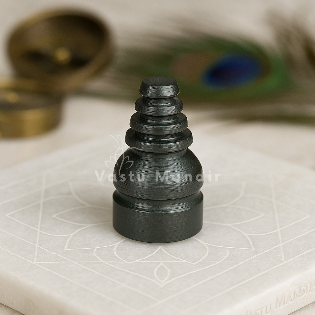 Iron cone stud displayed from a third angle on a pale stone surface