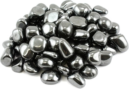 Pile of highly reflective metallic hematite stones isolated on a white background