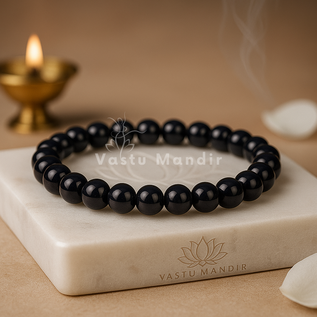 Black tourmaline hydro crystal bracelet shown in a second hand-held product view