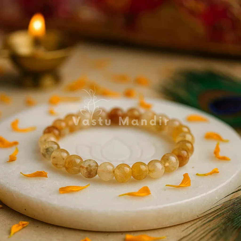 Natural citrine crystal bracelet shown with a hand in a lifestyle photograph