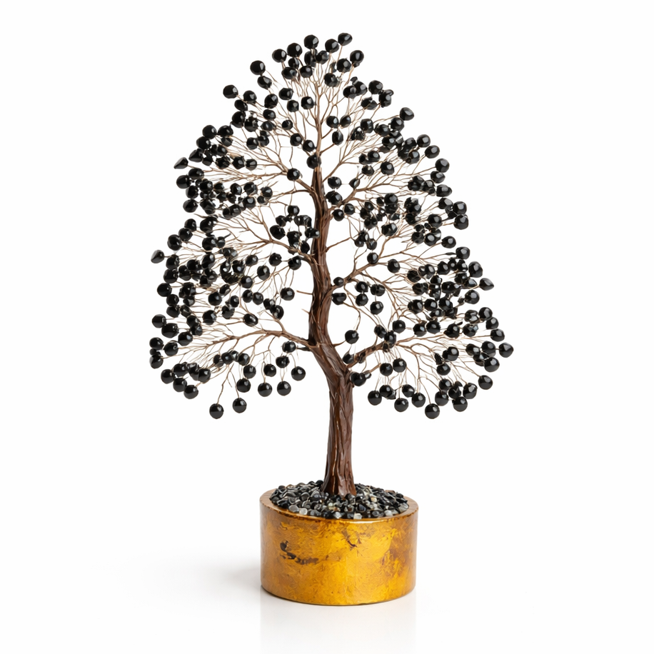 Black tourmaline crystal tree on a clean white background