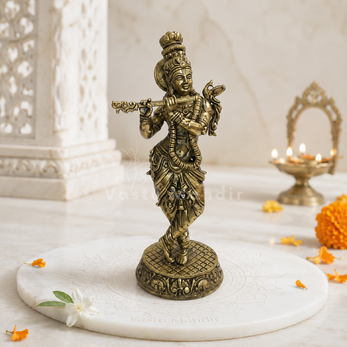 Brass Lord Krishna idol left-side view isolated on white background