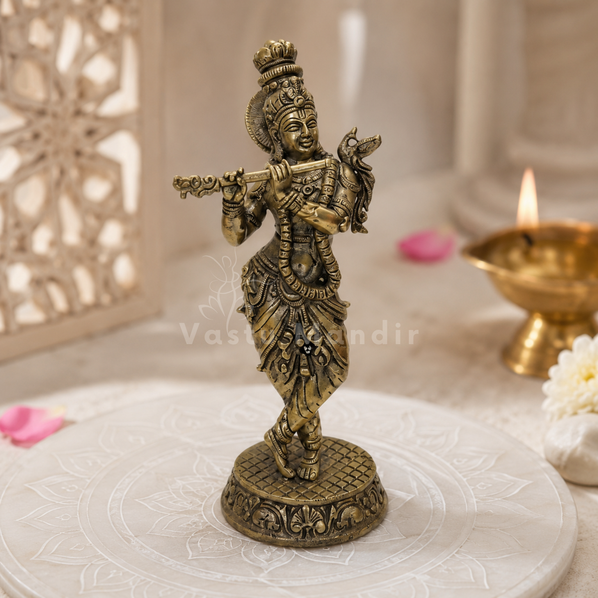 Brass Lord Krishna idol rear view showing the halo and garment details