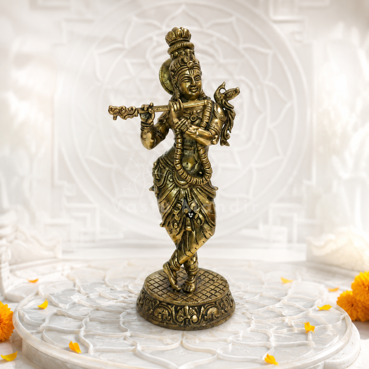 Brass Lord Krishna idol three-quarter view isolated on white background