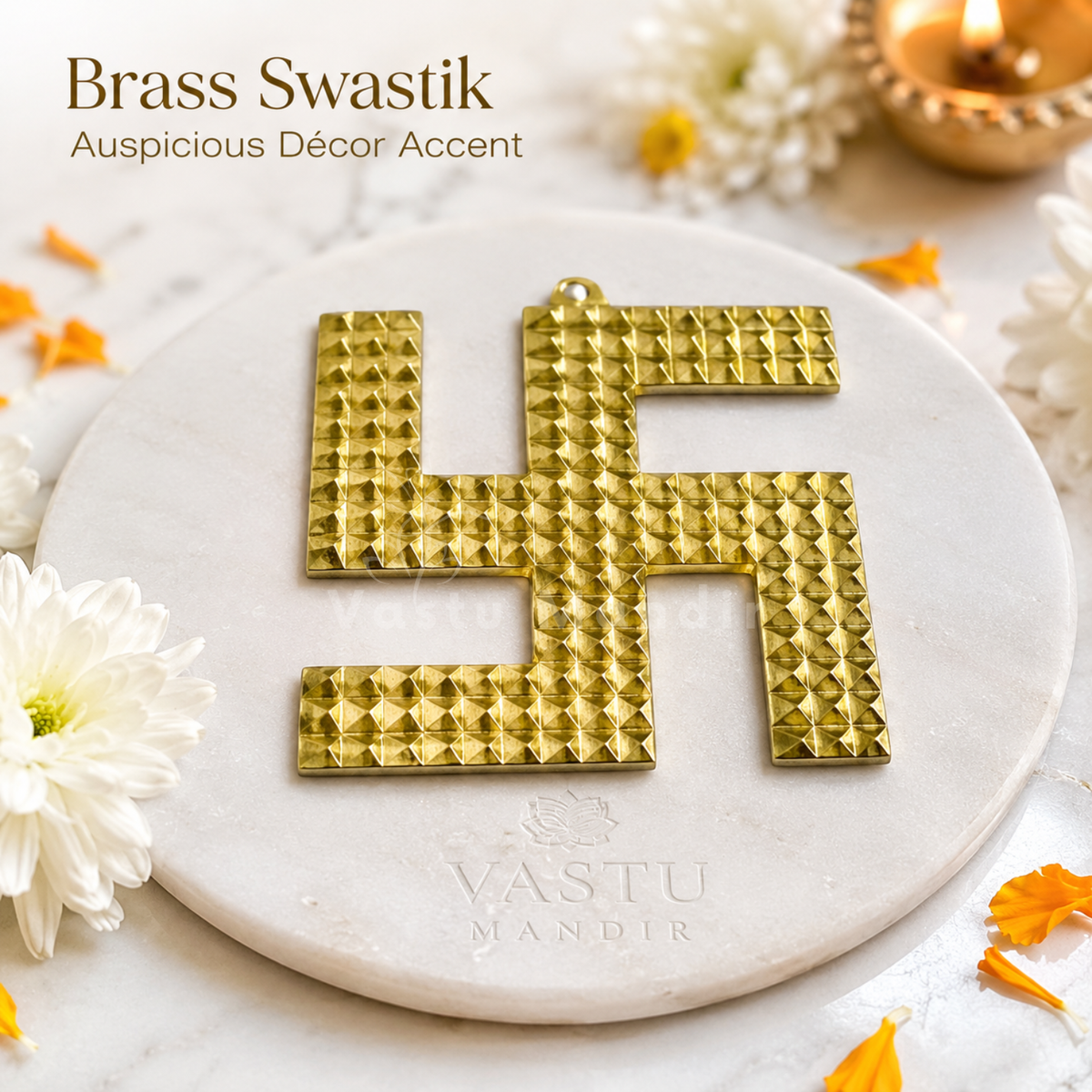 Brass swastik with raised pyramid pattern on a light background