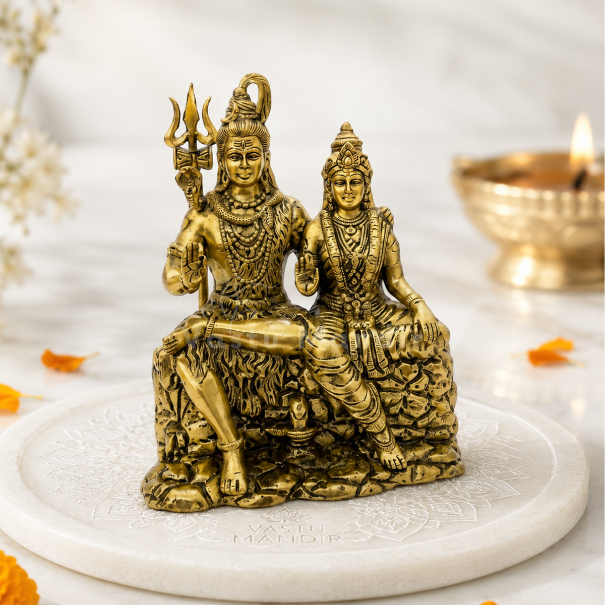 Brass Shiv Parvati idol in Uma Maheshwara pose on a detailed Mount Kailash base