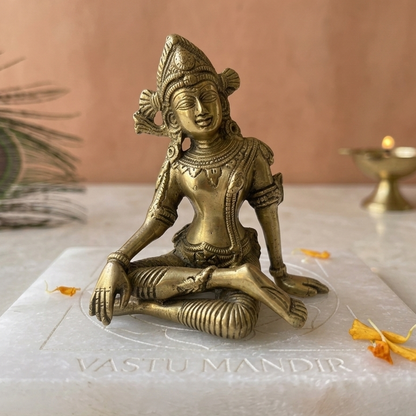 Brass Indra Dev idol alternate seated angle on a sacred plate