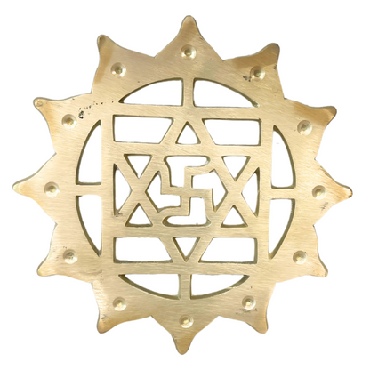 Brass Swastik (Kamal Satya) on a white background