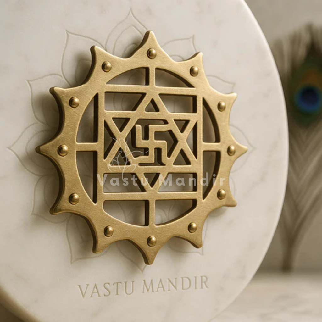 Close view of the brass Kamal Satiya lotus and Swastik design on marble