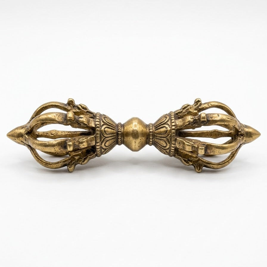 Brass Vajra Dorje ritual tool horizontal view isolated on white background