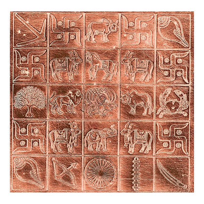 A square copper manjusha box featuring a 4x4 grid of embossed traditional symbols and motifs, including swastikas, animals, a tree, and a wheel, shown against a plain white background.