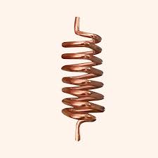 Copper coil on a beige background