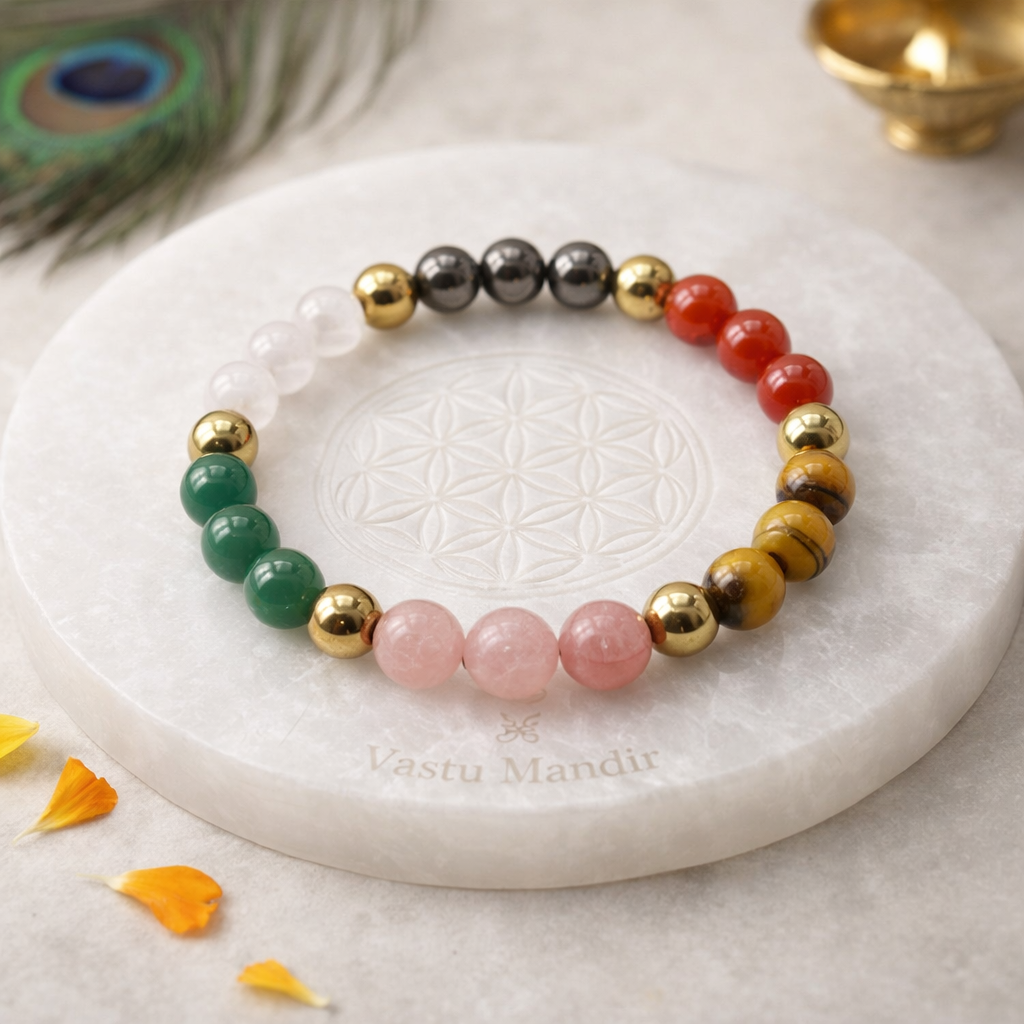 Dhan Vriddhi Natural beaded bracelet on a white stone surface with 'Vastu Mandir' branding