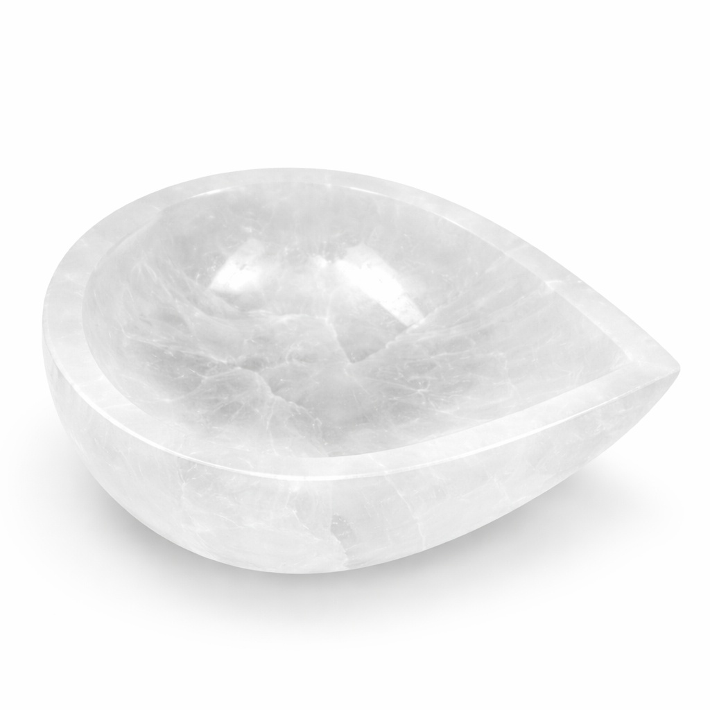 Teardrop-shaped white stone on a white background