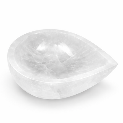 Teardrop-shaped white stone on a white background